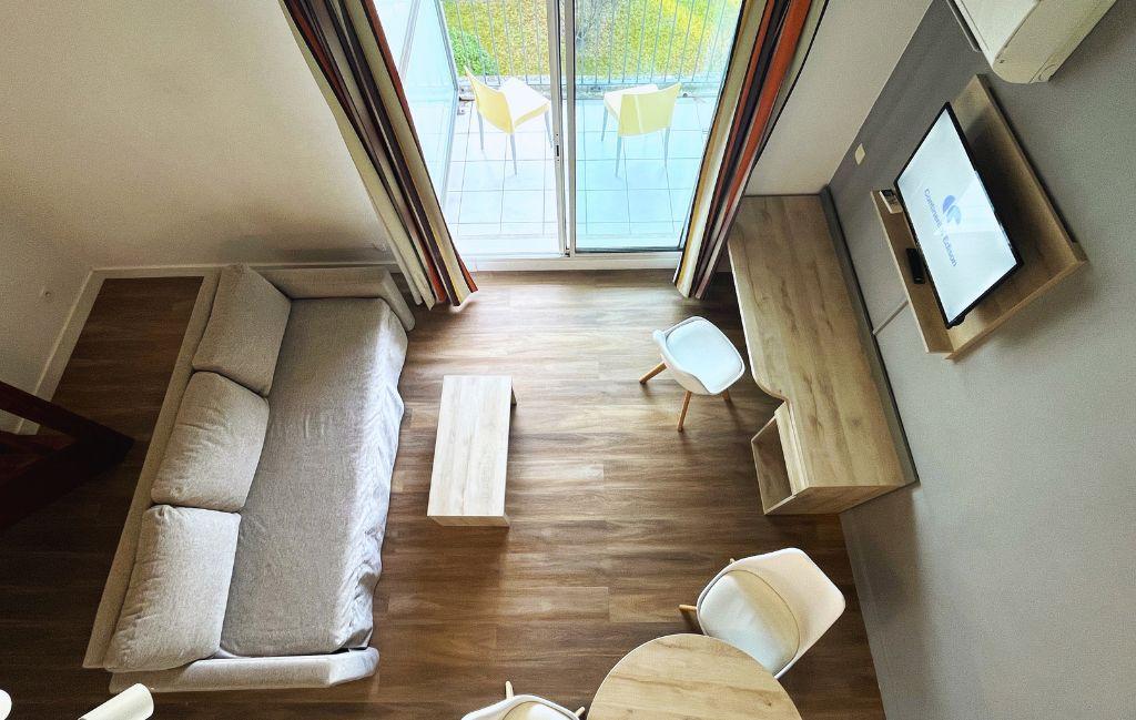 Slide 4-person apartment living room, mezzanine view, at Clos de la Chartreuse in Aix-en-Provence