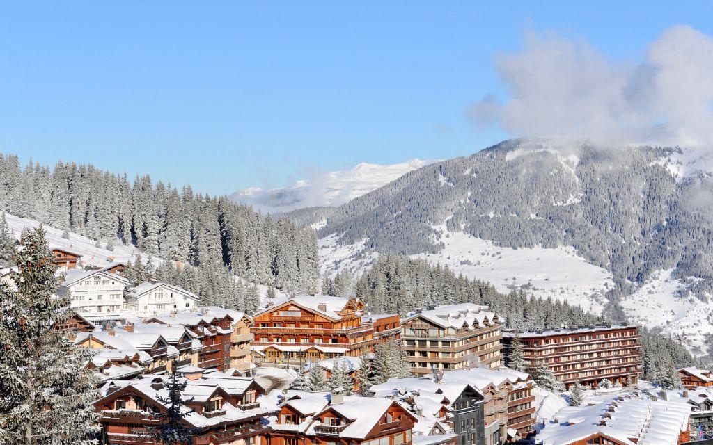 Slide Overview of La Tania Courchevel resort under the snow