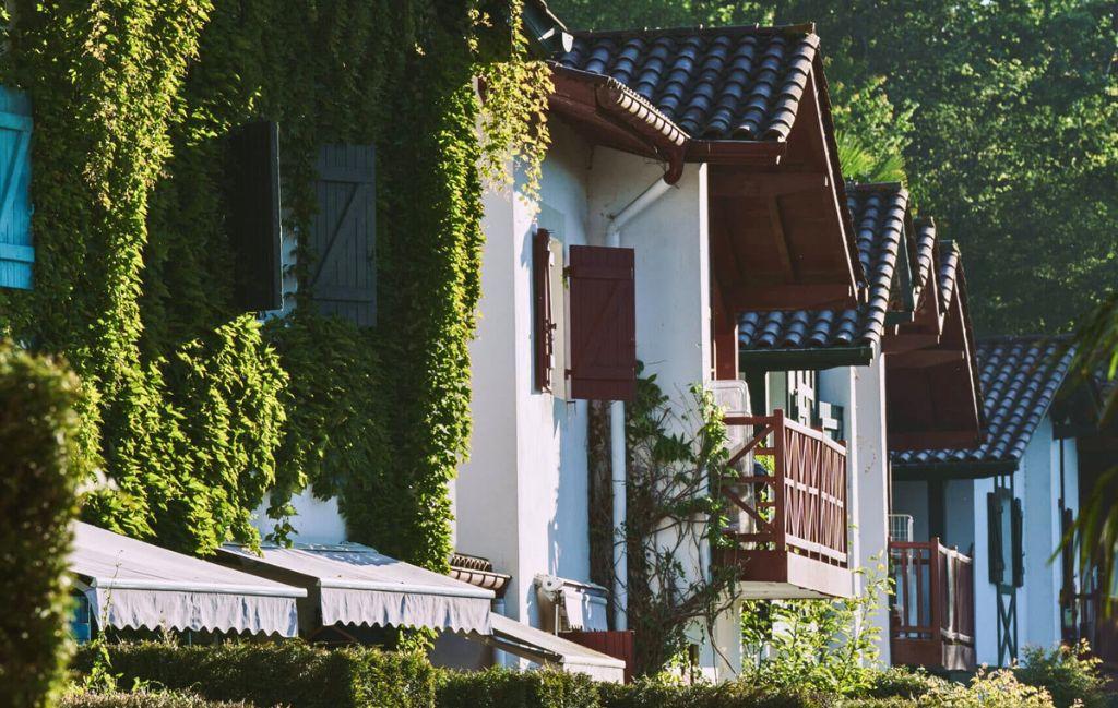 Slide Exterior view of the Basque-style accommodation at Les Collines Iduki