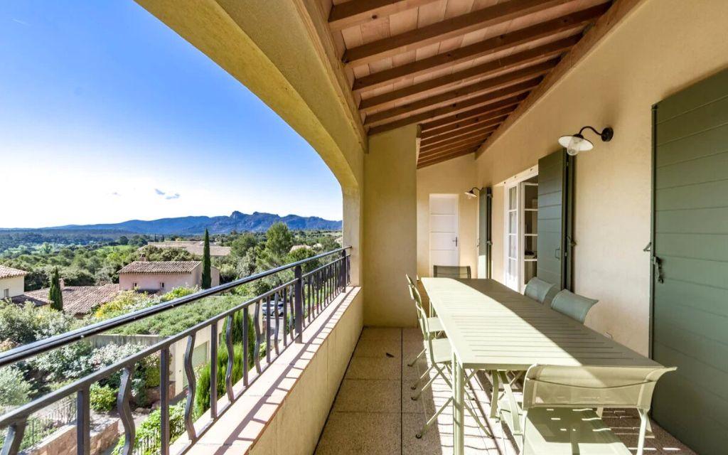 Slide Large covered balcony/terrace of an apartment with views of the Var countryside at Domaine de Saint-Endréol Golf & Spa Resort in La Motte-en-Provence