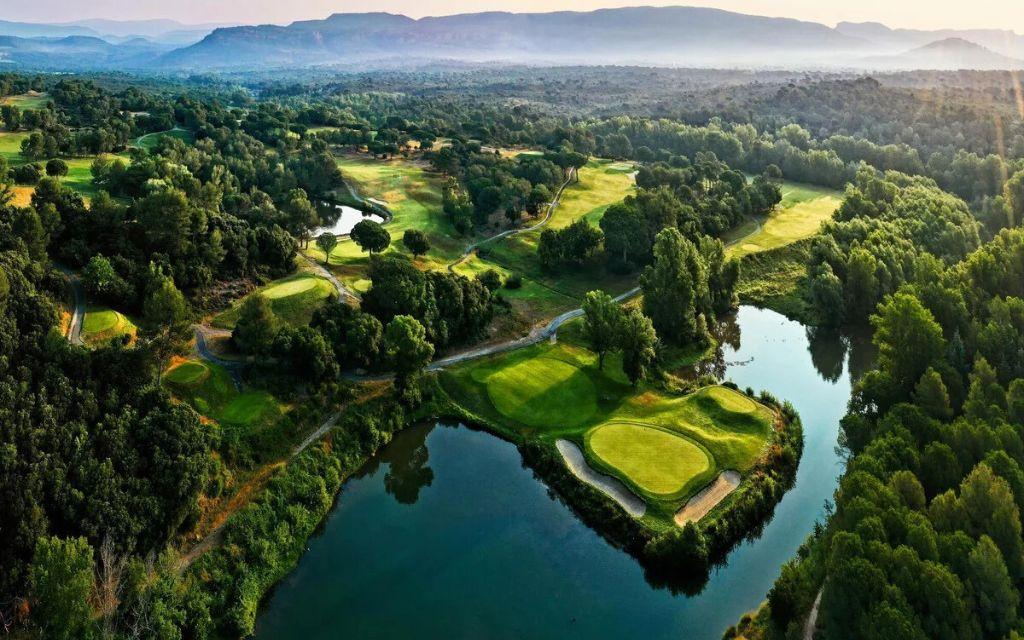 Slide Aerial view featuring nature and a lake within Domaine de Saint-Endréol Golf & Spa Resort in La Motte-en-Provence