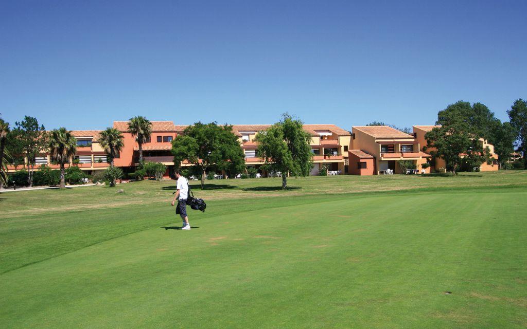 Slide Golf course in front of Résidence du Golf in Saint-Cyprien-Plage