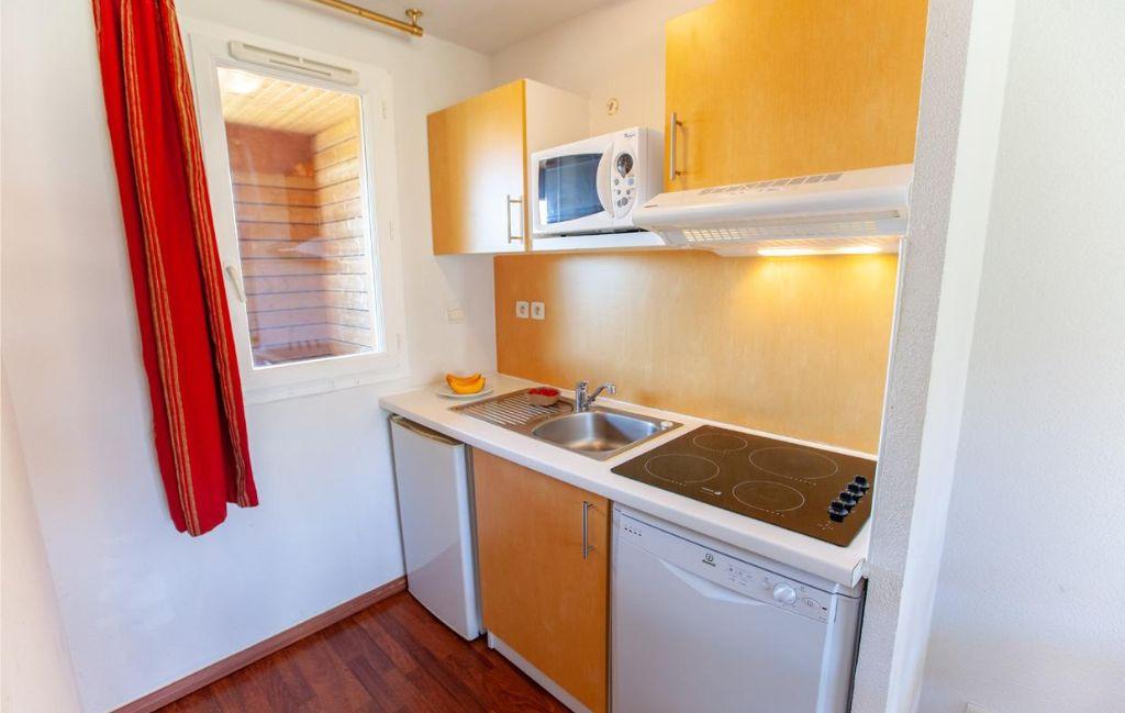 Slide Functional kitchen in the apartments at the Hameau de la Chalosse in Cassen