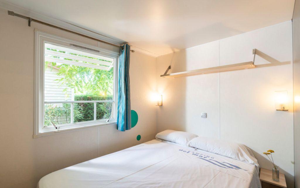 Slide First spacious double bedroom in a mobile home at Camping del Mar 4* in Malgrat de Mar