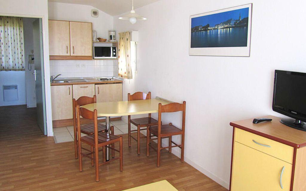 Slide Overall view of a dining space in a unit at the Ilbarritz residence