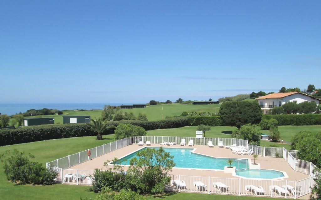 Slide Outdoor pool at the Ilbarritz residence in Bidart with sea view