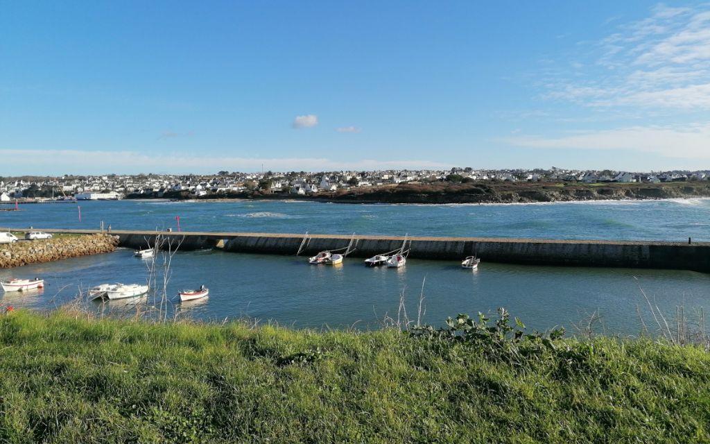 Slide Audierne in Brittany, view of the harbour and the Atlantic Ocean