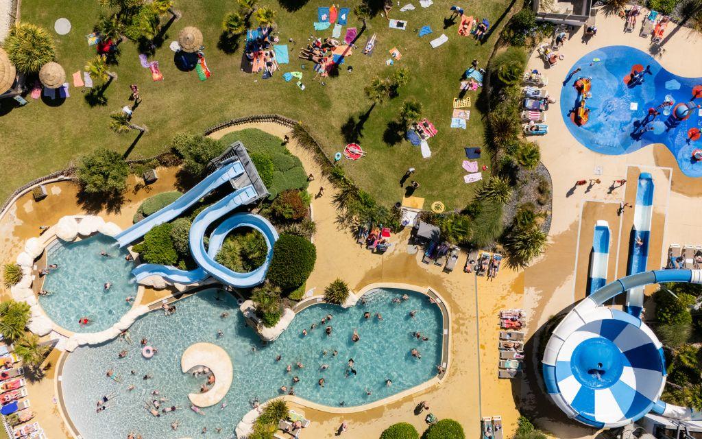 Slide Aerial view of the 1,500 m² water park at Les Places Dorées***** campsite
