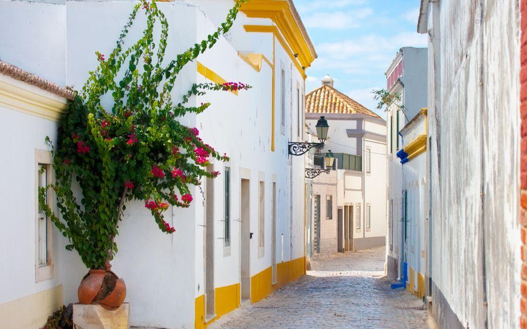 Slide White alleyway in the town of Tavira, southern Portugal