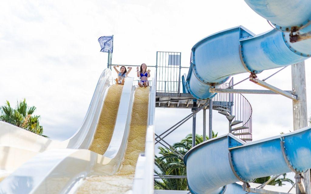 Slide Triple-lane water slides within the water park at Résidence Antinéa
