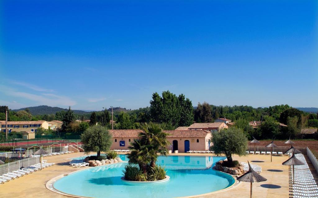 Slide Outdoor pool with double slides at Le Clos des Oliviers residence