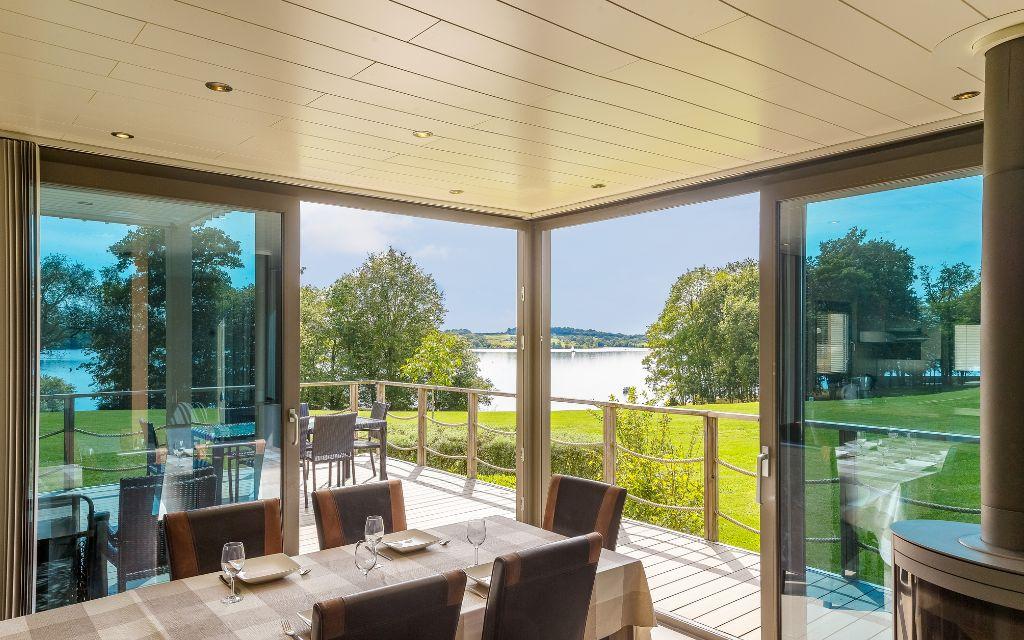 Slide Large, spacious villas with open views to the outdoors facing the lake at Golden Lakes Village Estate