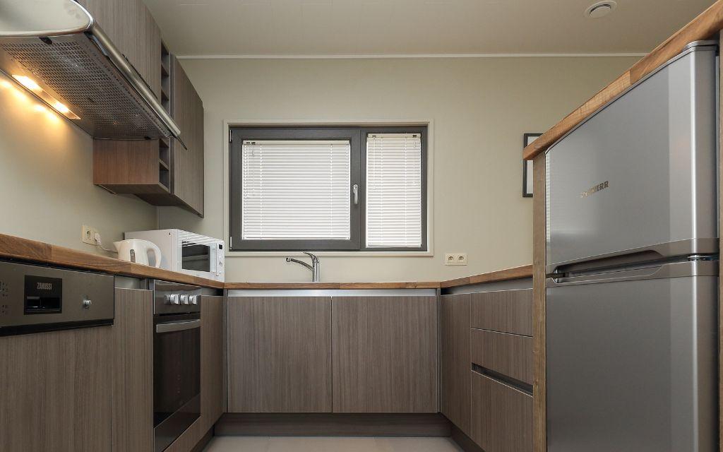 Slide Spacious and fully equipped kitchen at Golden Lakes Village Estate