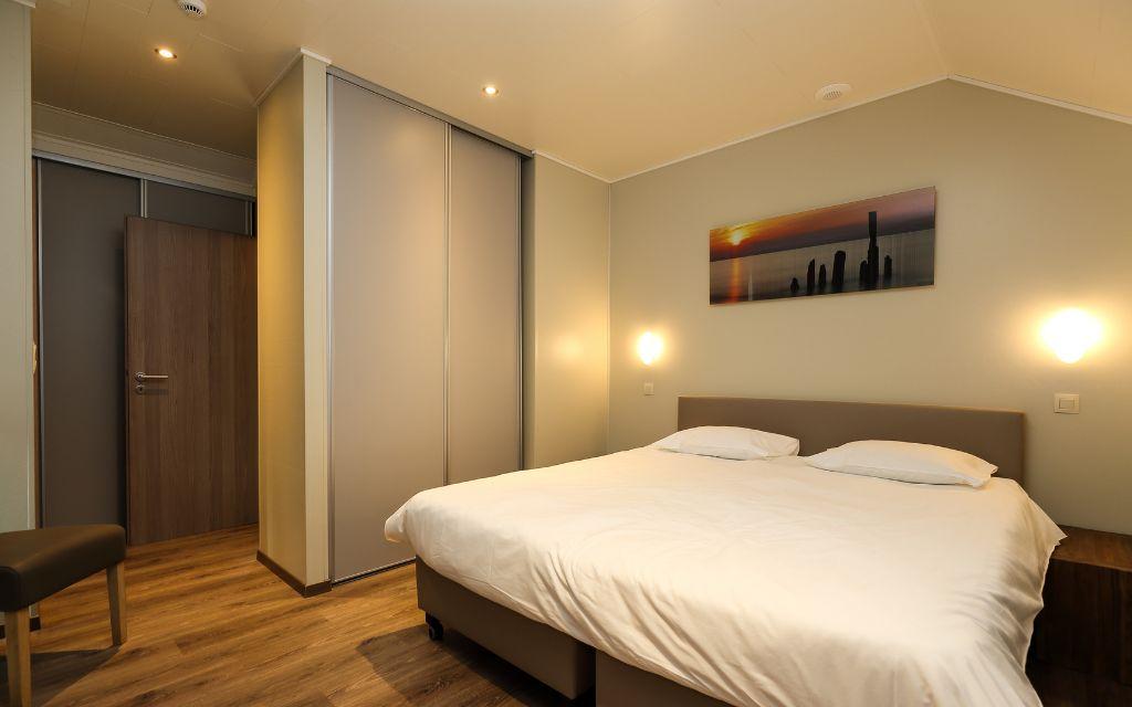 Slide Master bedroom with a double bed at Golden Lakes Village Estate