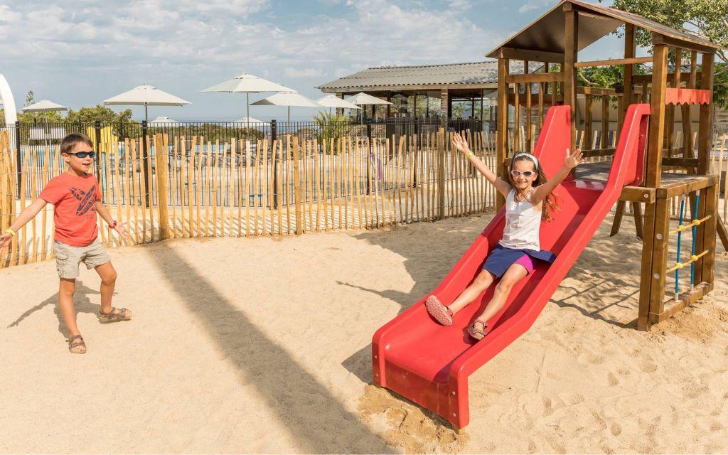 Slide Children’s playground at Camping Lacasa in Corsica