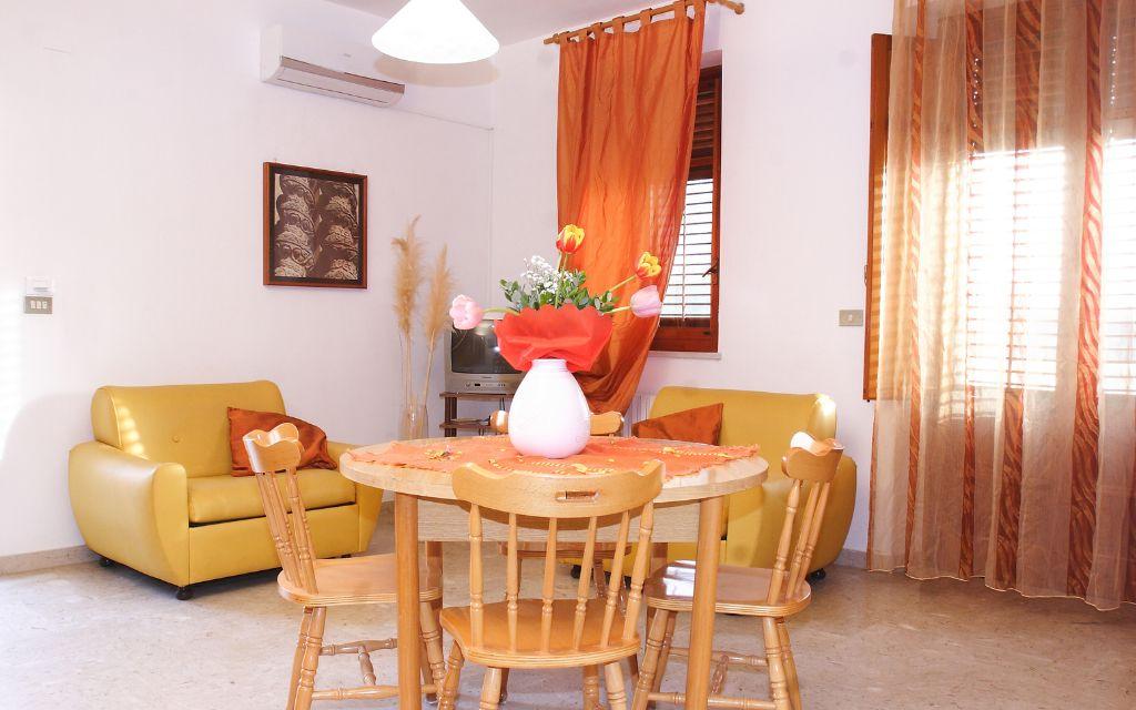 Slide Living room in accommodation at the Baia d’Oro residence in Sicily