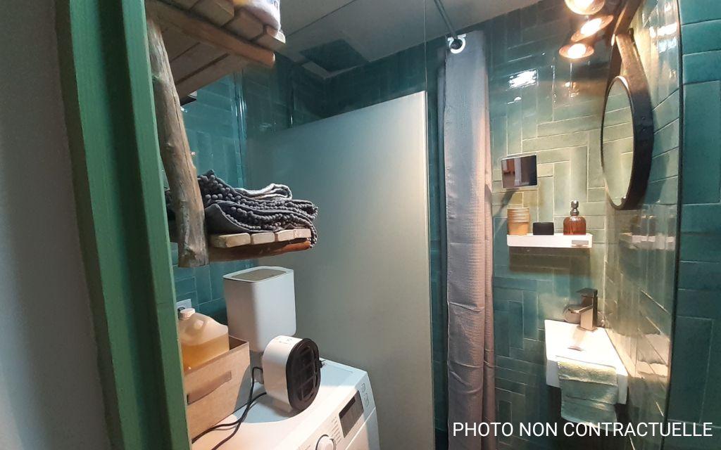 Slide Shower room with a washing machine in selected Valfréjus studios