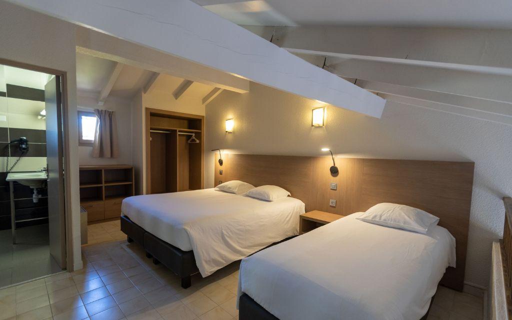 Slide Mezzanine in an apartment at Paese Serenu Residence with sleeping accommodation for three and a shower room