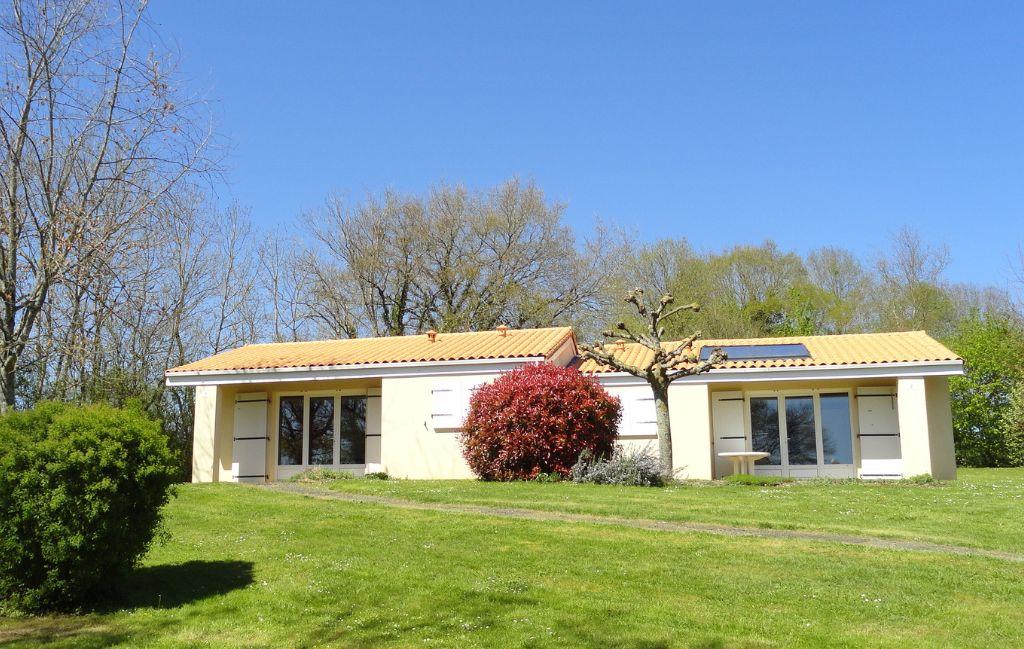 Slide Single-storey holiday cottages in the green surroundings of Le Domaine du Lambon