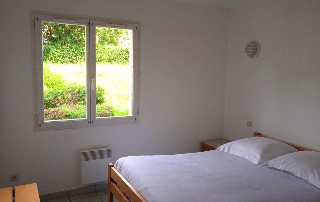 Slide Bedroom with one double bed and garden view at Le Domaine du Lambon