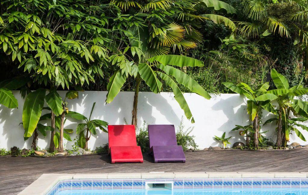 Slide deck chair by the pool at the Les Collines Iduki residence in France