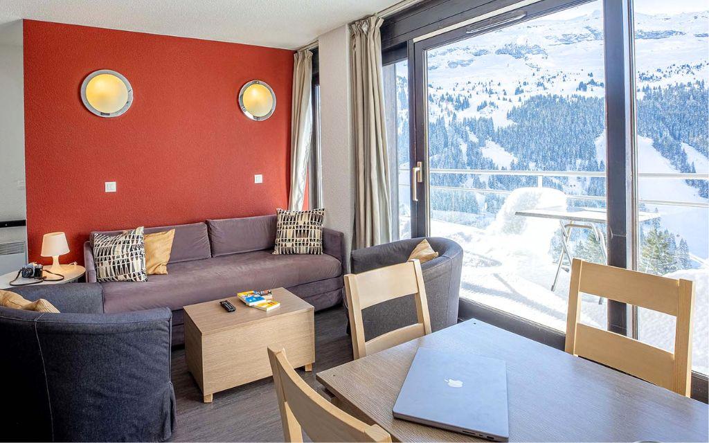 Slide Living room in the 8-person apartments at the Les Terrasses de Veret residence