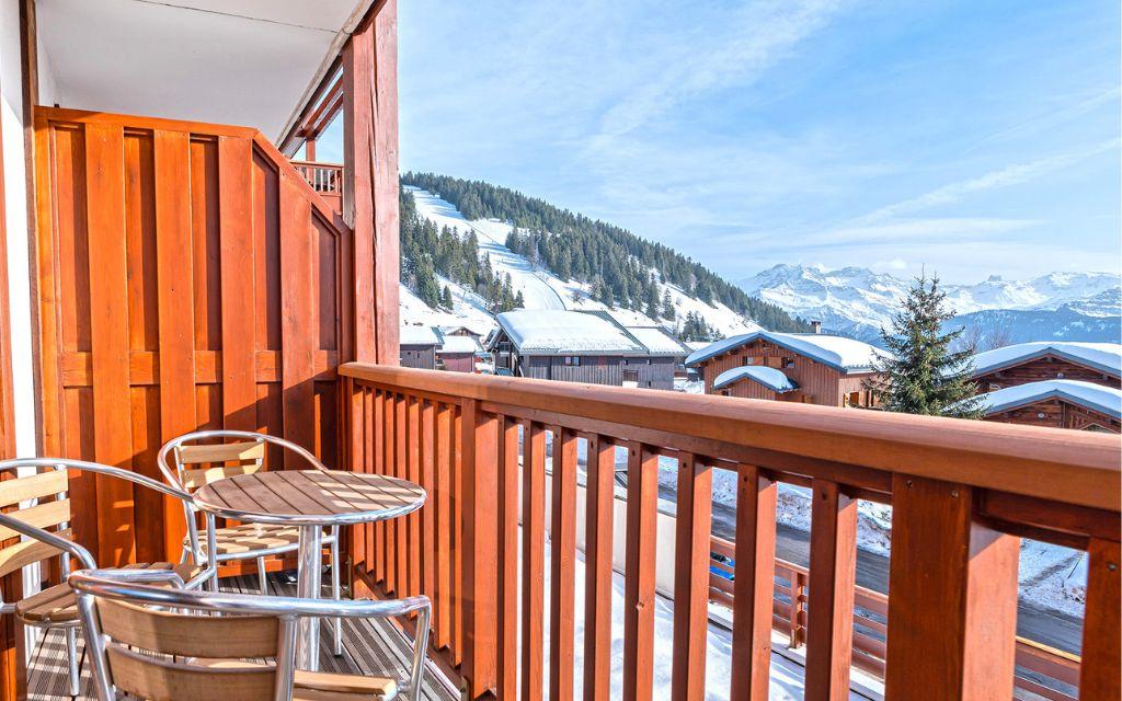 Slide Balcon de la résidence Les Chalets d’Emeraude aux Saisies sous la neige