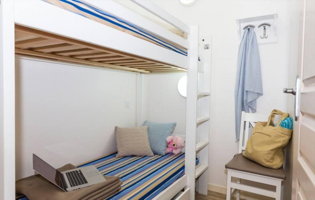 Slide Chambre enfants avec lits superposés d'un des logements