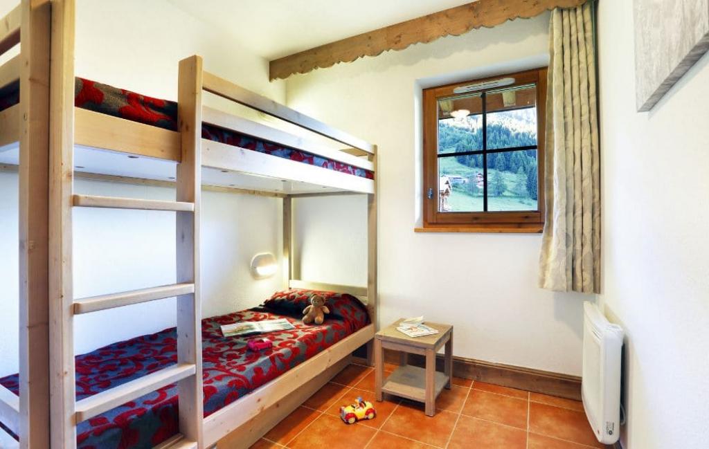 Slide Chambre avec lit superposé d'un des logements