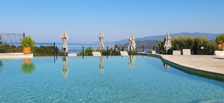Campsite with a swimming pool in the heart of a lush green environment in Calcatoggio, Corsica