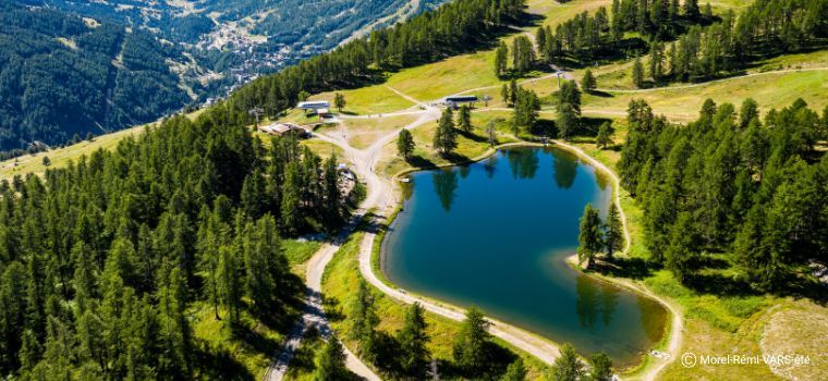 Vars ski station in summer with a lake