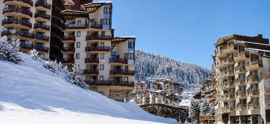 Grands Bois Residence in La Tania Courchevel under a blanket of snow