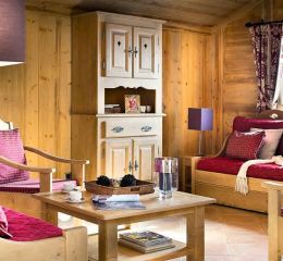 Spacious and comfortable living room in one of the apartments at Le Village de Lessy residence in Le Grand Bornand