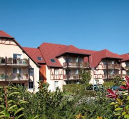 Résidence au charme architectural typique d'Alsace nommée Le Domaine des Rois à Bergheim