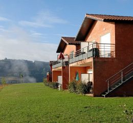 Building façade of the La Marquisié residence overlooking the fields and the Tarn