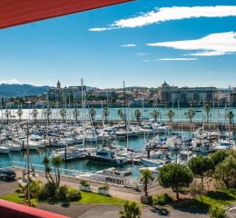 View from the balcony of an apartment in the Sokoburu residence overlooking the port of Hendaye