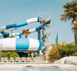 Spiral water slide within the water park at Les Places Dorées campsite