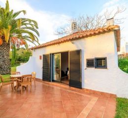 Villa within the Pedras del Rei residence in Portugal with a large private terrace in front of the entrance