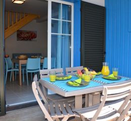 Outdoor terrace of an accommodation within La Grenadine residence in Marseillan-Plage
