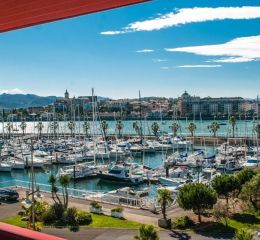 View from the balcony of an apartment in the Sokoburu residence overlooking the port of Hendaye
