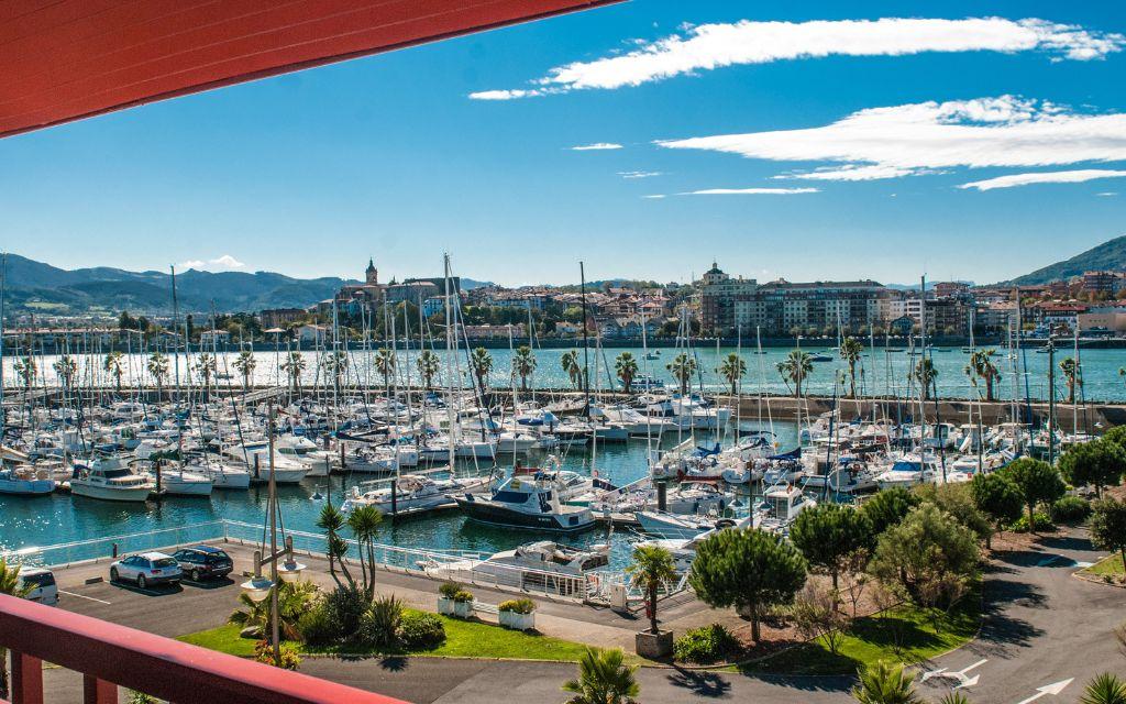 Slide View from the balcony of an apartment in the Sokoburu residence overlooking the port of Hendaye