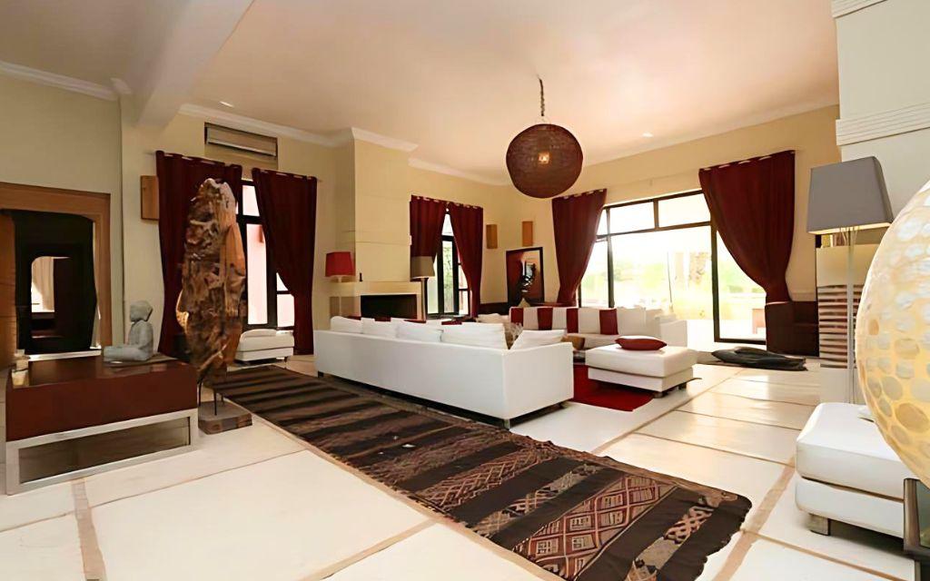 Slide One of the living rooms at Villa Dar Dream in Morocco with large sofas