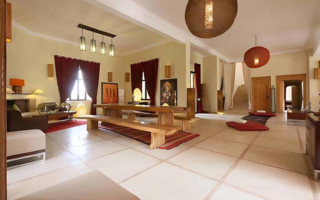 Slide Living area with lounge and dining area at Villa Dar Dream in Morocco